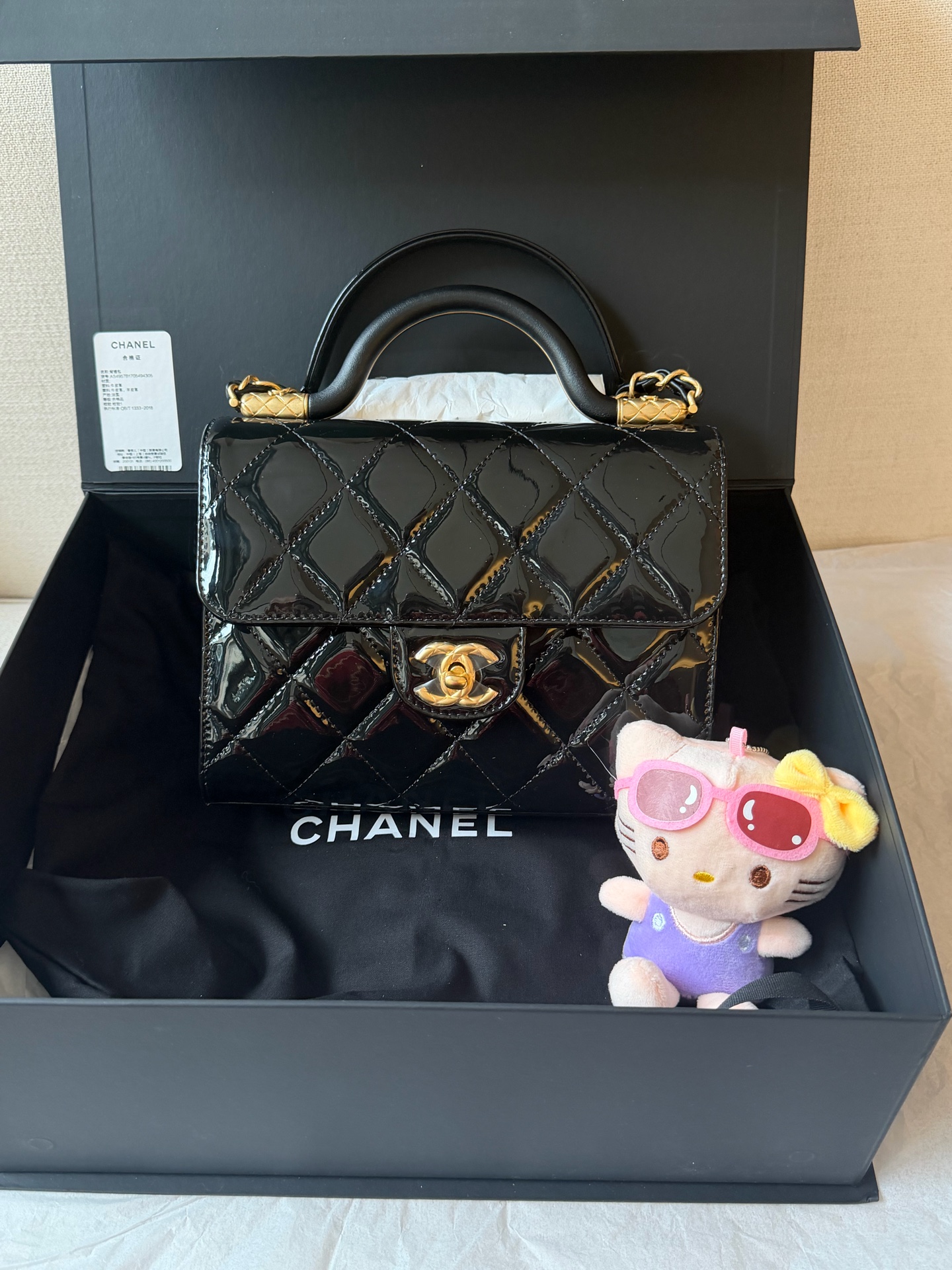 Chanel 24A Handle Bag Black Gold Patent Leather